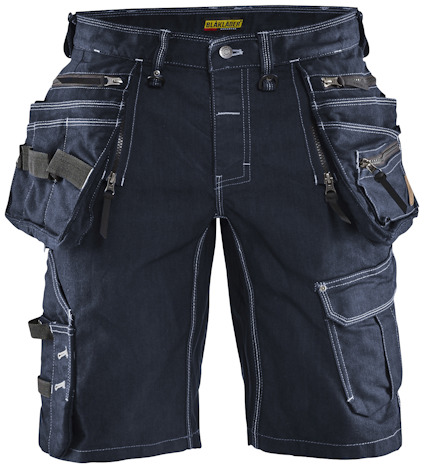 Mörkblå arbetsshorts med flera fickor och hälla. Vita sömmar och blixtlåsdetaljer.