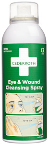 Grön flaska med vit kork, märkt "Cederroth Eye & Wound Cleansing Spray". Illustration visar användning och avstånd 10-15 cm.