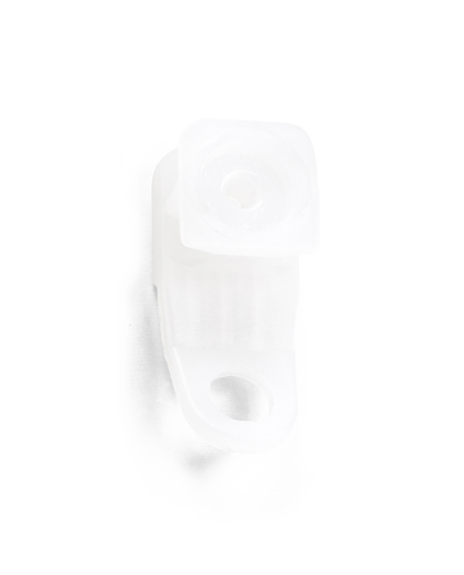 Vit, transparent plastkomponent med två hål, ett cirkulärt och ett ovalt, liggande mot vit bakgrund.