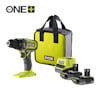 Borrskruvdragare, två batterier, laddare och bärväska i grönt och svart med RYOBI-logotyp.