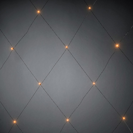 Ljusnät med varma, glödande LED-lampor ordnade i ett rutnätmönster på mörk bakgrund.