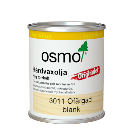 Plåtburk med hårdvaxolja, Osmo logotyp och text om användning för träytor.