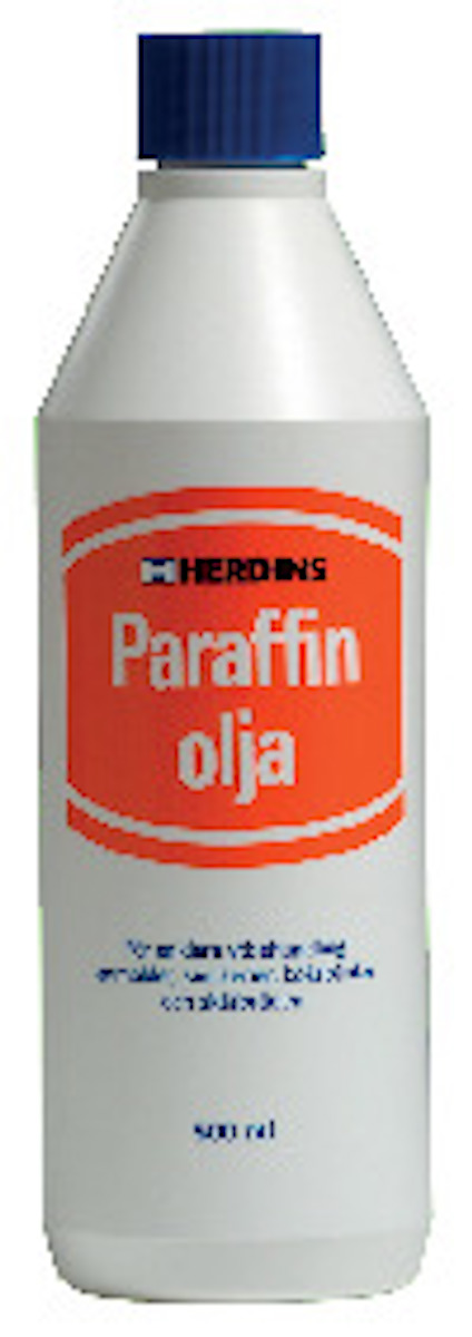 Vit flaska med blått lock, etikett med texten "HERDINS Paraffin olja" och användningsområden i rött fält.