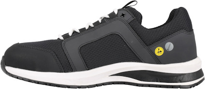 Svart och vit sportig sko med snörning och en gul etikett på sidan.