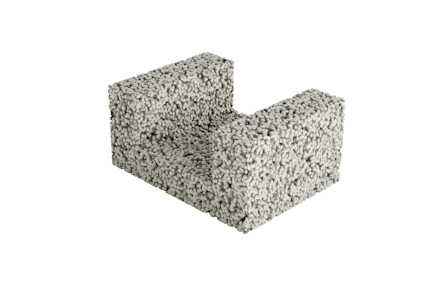 Betongblock i U-form med en grå texturerad yta på en vit bakgrund.